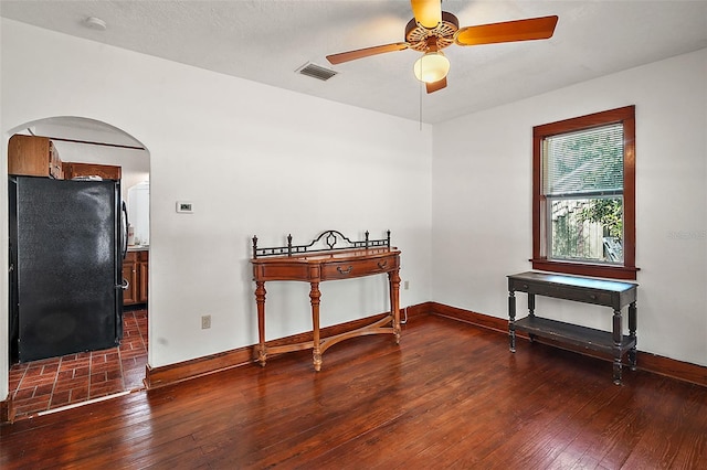 misc room featuring dark hardwood / wood-style floors and ceiling fan