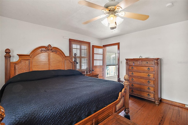 bedroom with hardwood / wood-style flooring and ceiling fan