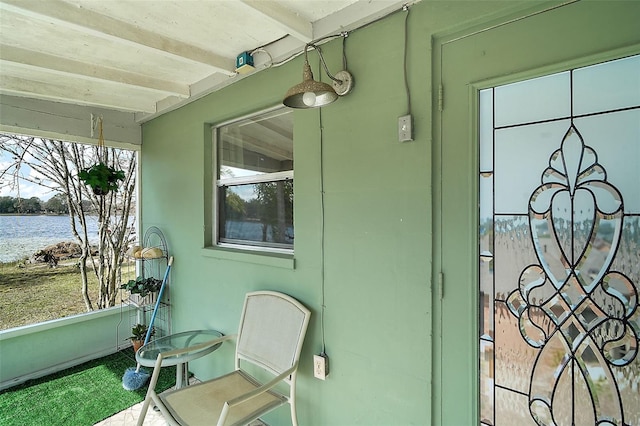 sunroom / solarium with beamed ceiling