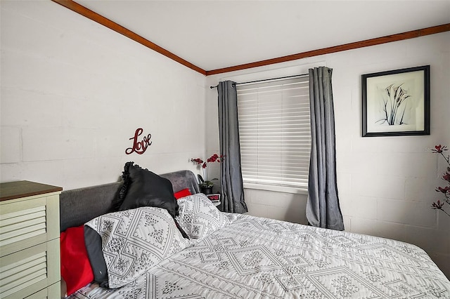 bedroom with crown molding