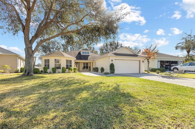 view of front of property featuring a garage and a front yard