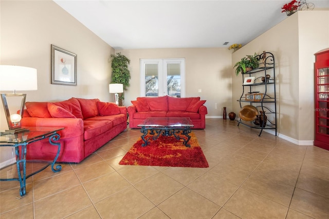 tiled living room featuring french doors