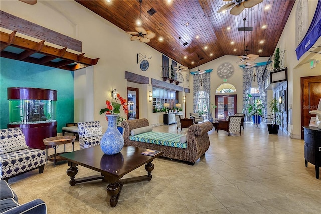 tiled living room with high vaulted ceiling, wooden ceiling, and ceiling fan