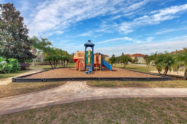 view of playground featuring a lawn