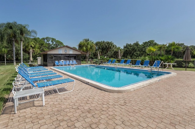 view of pool featuring a patio