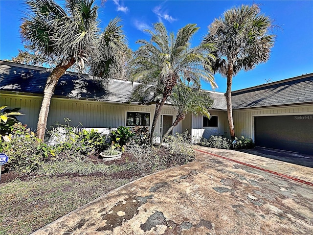 ranch-style home with a garage