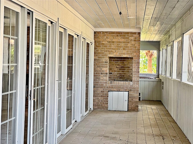 view of patio featuring a fireplace