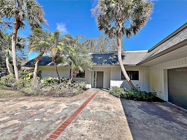 view of front of house with a patio area