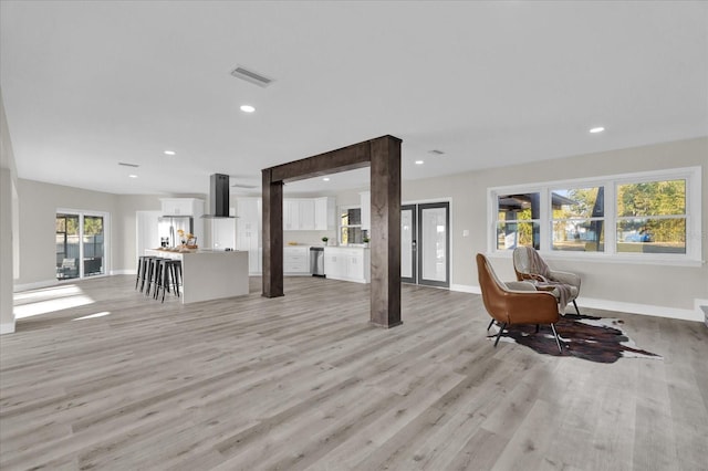 living room with light hardwood / wood-style floors