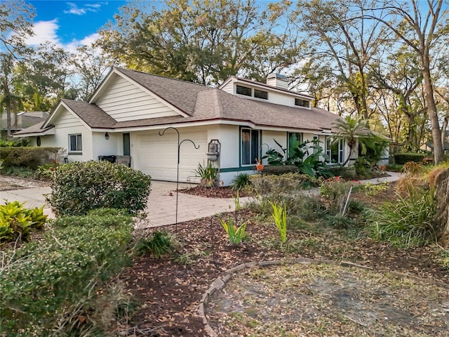 view of front of home with a garage