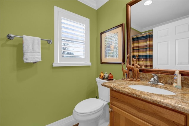 bathroom featuring crown molding, curtained shower, vanity, and toilet