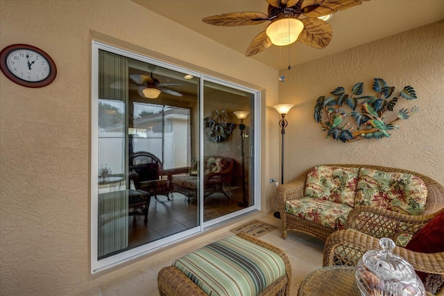 interior space featuring ceiling fan