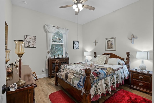 bedroom featuring ceiling fan and light wood-type flooring