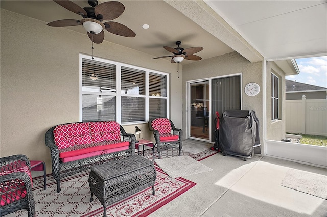 view of patio featuring outdoor lounge area and ceiling fan