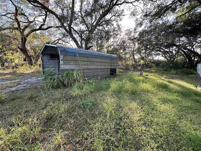 view of yard with a carport