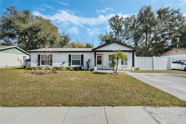 single story home with a front yard