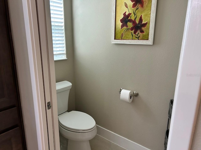 bathroom featuring toilet