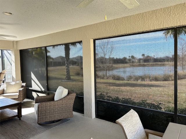 sunroom / solarium with ceiling fan