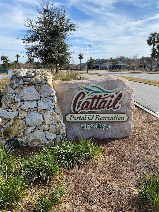 view of community sign