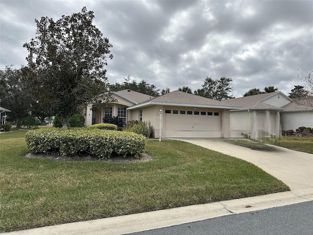 single story home with a garage and a front yard