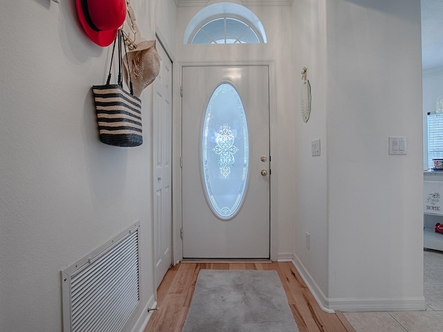 doorway featuring light hardwood / wood-style floors