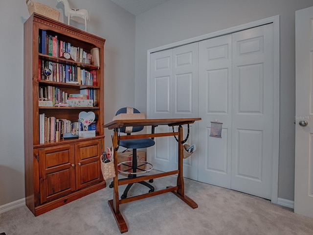 home office with light colored carpet