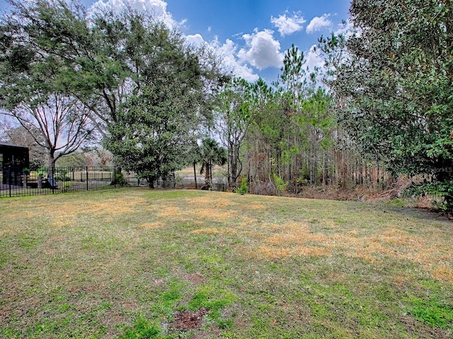 view of yard with fence