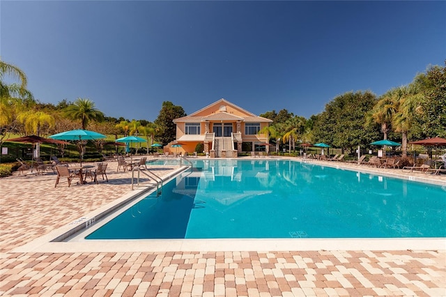 pool with a patio area