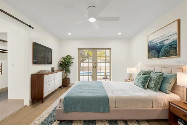 bedroom with ceiling fan, recessed lighting, access to exterior, french doors, and light wood finished floors