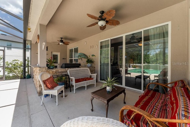 view of patio featuring ceiling fan and an outdoor living space