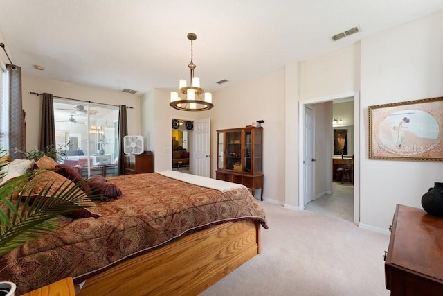 bedroom with light carpet, baseboards, and visible vents