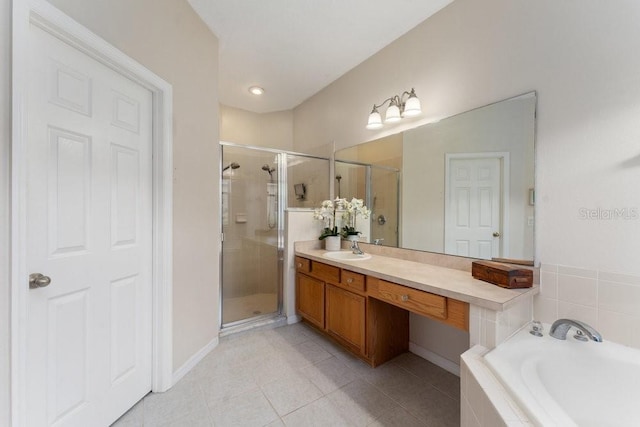 full bathroom with a garden tub, a shower stall, tile patterned flooring, and vanity