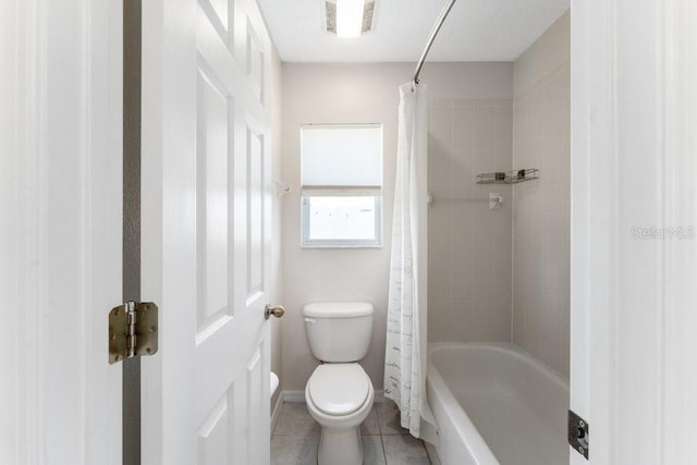 bathroom with baseboards, visible vents, toilet, tile patterned flooring, and shower / bathtub combination with curtain