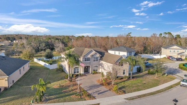 birds eye view of property with a residential view