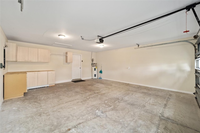 garage featuring a garage door opener and water heater