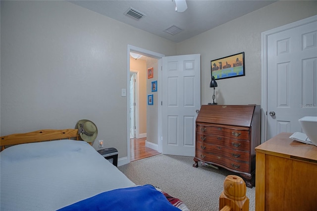 carpeted bedroom with ceiling fan