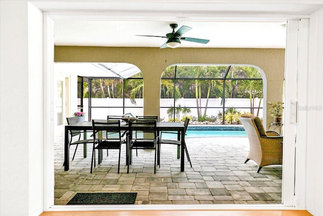 exterior space featuring plenty of natural light and ceiling fan