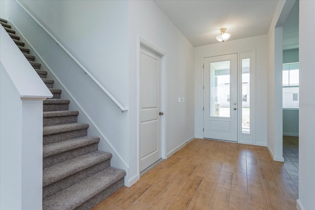 entrance foyer with light hardwood / wood-style flooring