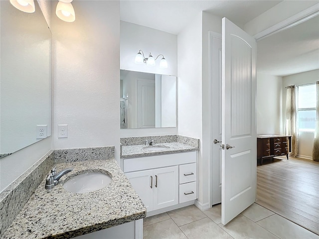 bathroom featuring vanity and tile patterned floors