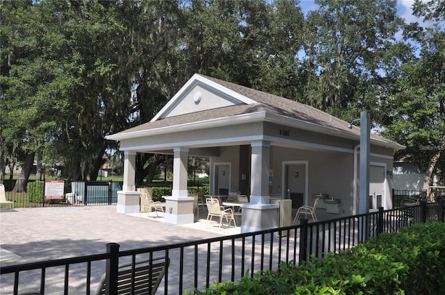 exterior space with a gazebo and a patio