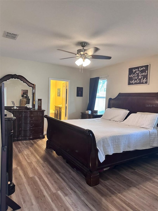 bedroom featuring ceiling fan and wood-type flooring