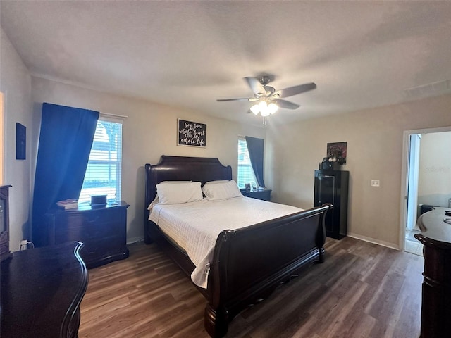 bedroom with dark wood-type flooring and ceiling fan