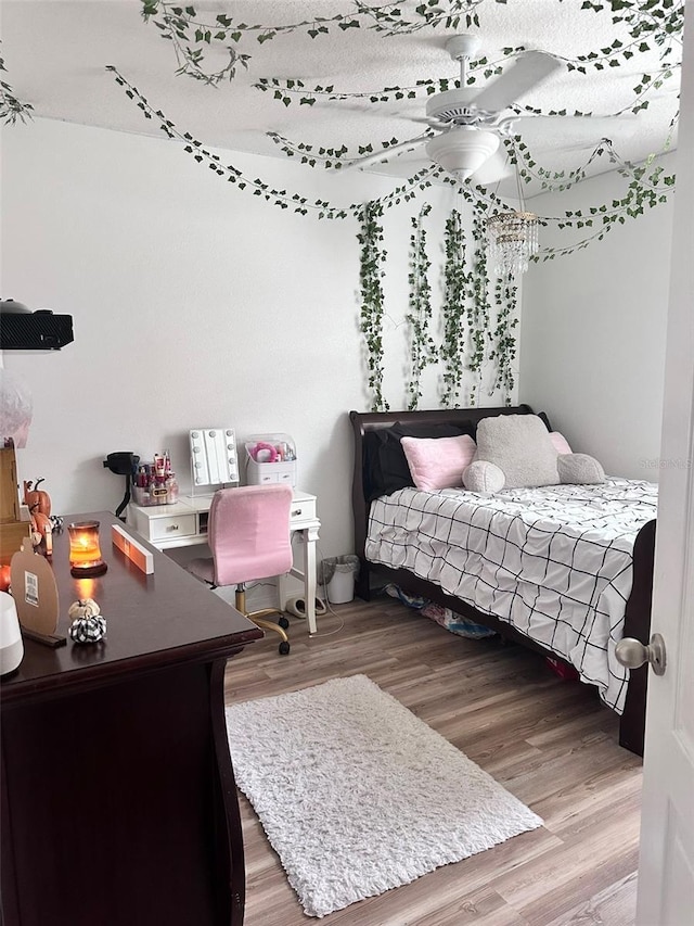 bedroom featuring wood-type flooring