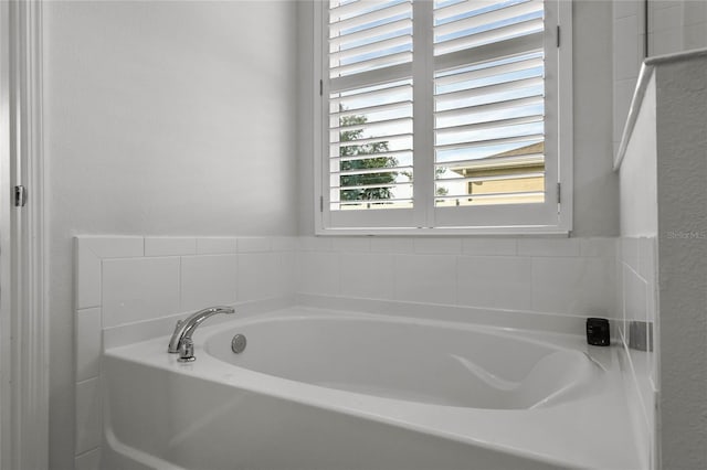 bathroom with a tub