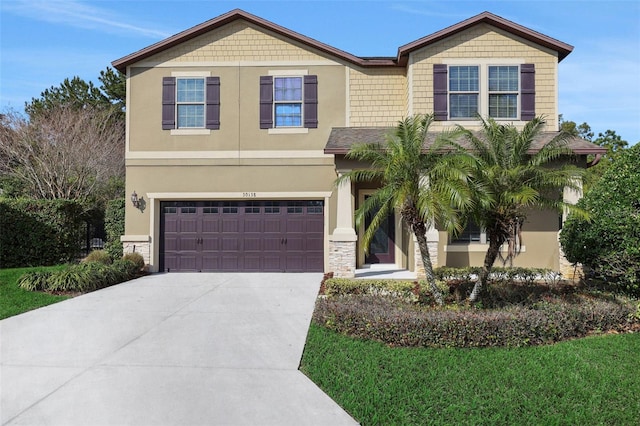 view of front of property with a garage