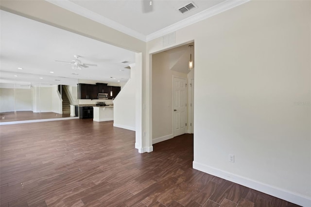 unfurnished living room featuring crown molding, ceiling fan, and dark hardwood / wood-style flooring