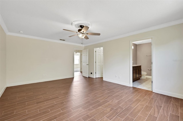 unfurnished room featuring ceiling fan, crown molding, and light hardwood / wood-style floors