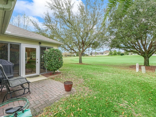 view of yard with a patio area