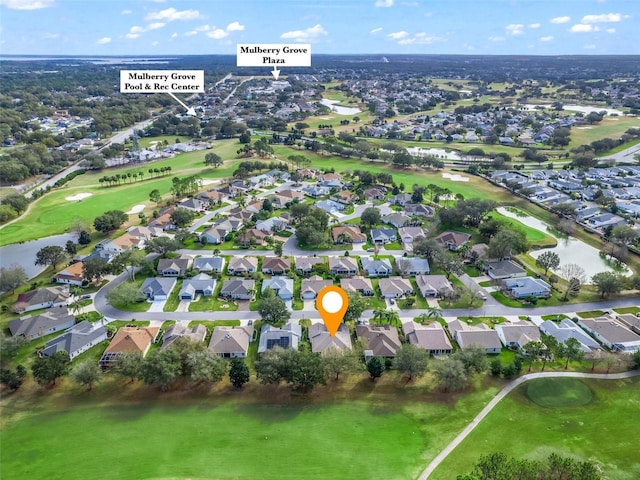 bird's eye view with a water view and a residential view