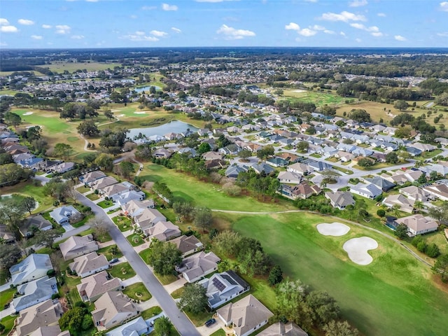 birds eye view of property featuring a residential view, a water view, and golf course view